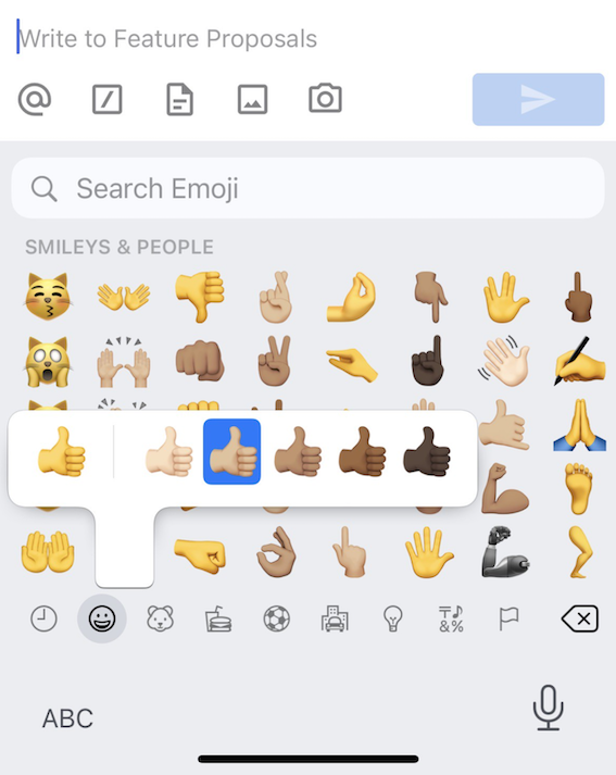 Select alternate emoji skin tones on Apple devices.